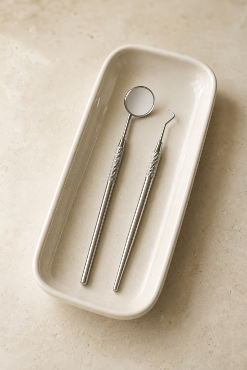 Clean dental examination instruments arranged on a tray
